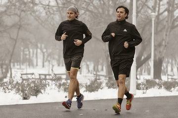 Two men running